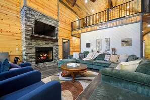 Älytelevisio, takka, pöytätennispöytä, stereot