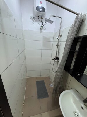Shower, towels, toilet paper