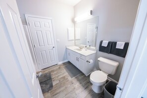 Hair dryer, towels, soap, toilet paper
