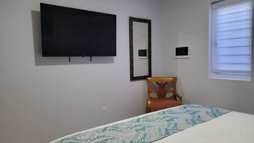Blackout drapes, soundproofing, iron/ironing board, free WiFi