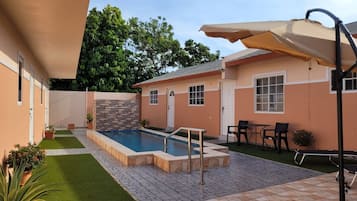 Outdoor pool, open 8:00 AM to 9:30 PM, pool umbrellas, sun loungers