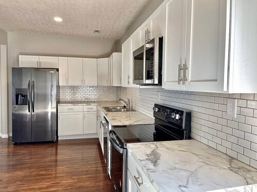 Cozy 4 Bedroom 2 Bath Omaha Home w/ plenty of parking!