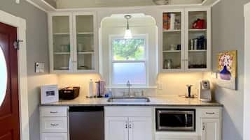 Microwave, coffee/tea maker, toaster, cookware/dishes/utensils