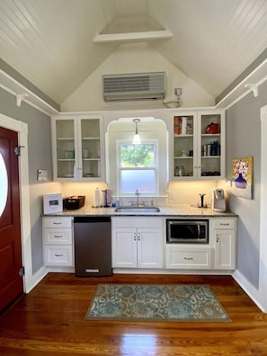 Microwave, coffee/tea maker, toaster, cookware/dishes/utensils