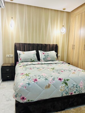 1 غرفة نوم ومكواة/لوح كي وواي فاي مجانًا وملاءات أسرّة