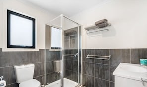 Shower, hair dryer, towels, soap