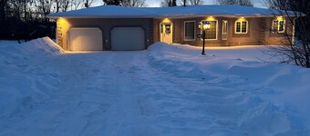 Enjoy a rural 2 bedroom 2 bath family home with garage in north west Manitoba.