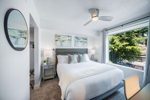 1 bedroom, desk, iron/ironing board, travel crib