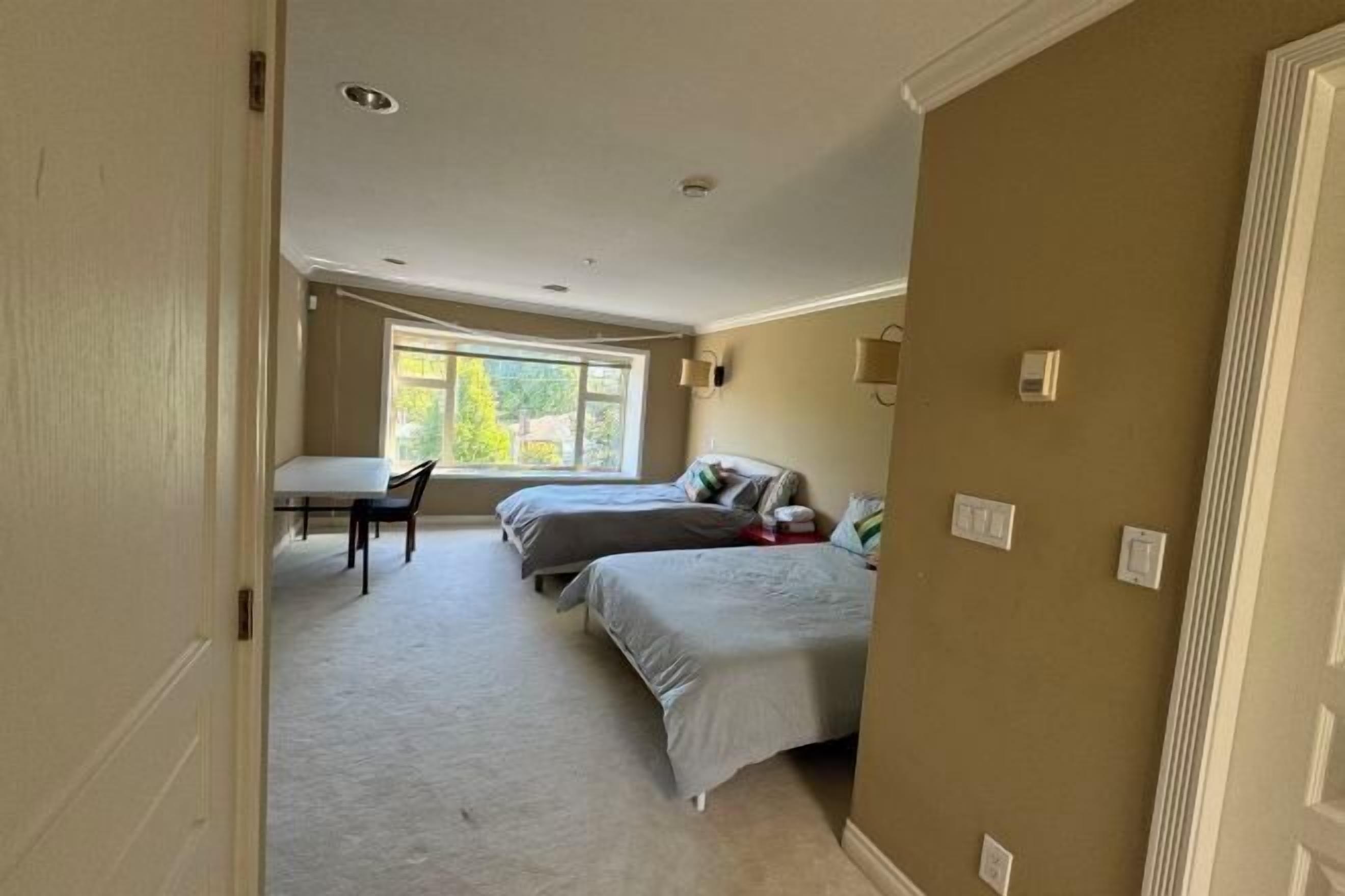 Desk, laptop workspace, blackout drapes, soundproofing