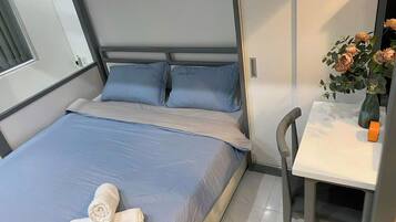 Family Apartment, 3 Bedrooms, Balcony, City View | Premium bedding, minibar, individually furnished, desk