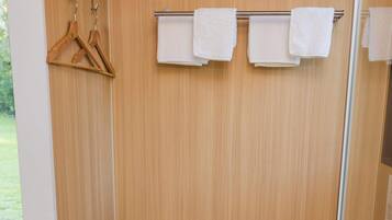 Shower, hair dryer, towels