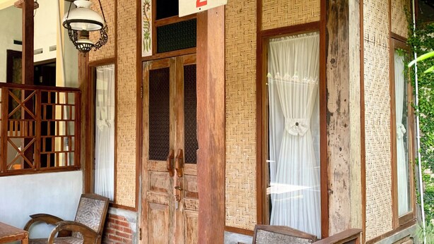 A traditional wooden structure with a sign reading "DIANA'S 2". - Diana's Homestay (Banyuwangi)