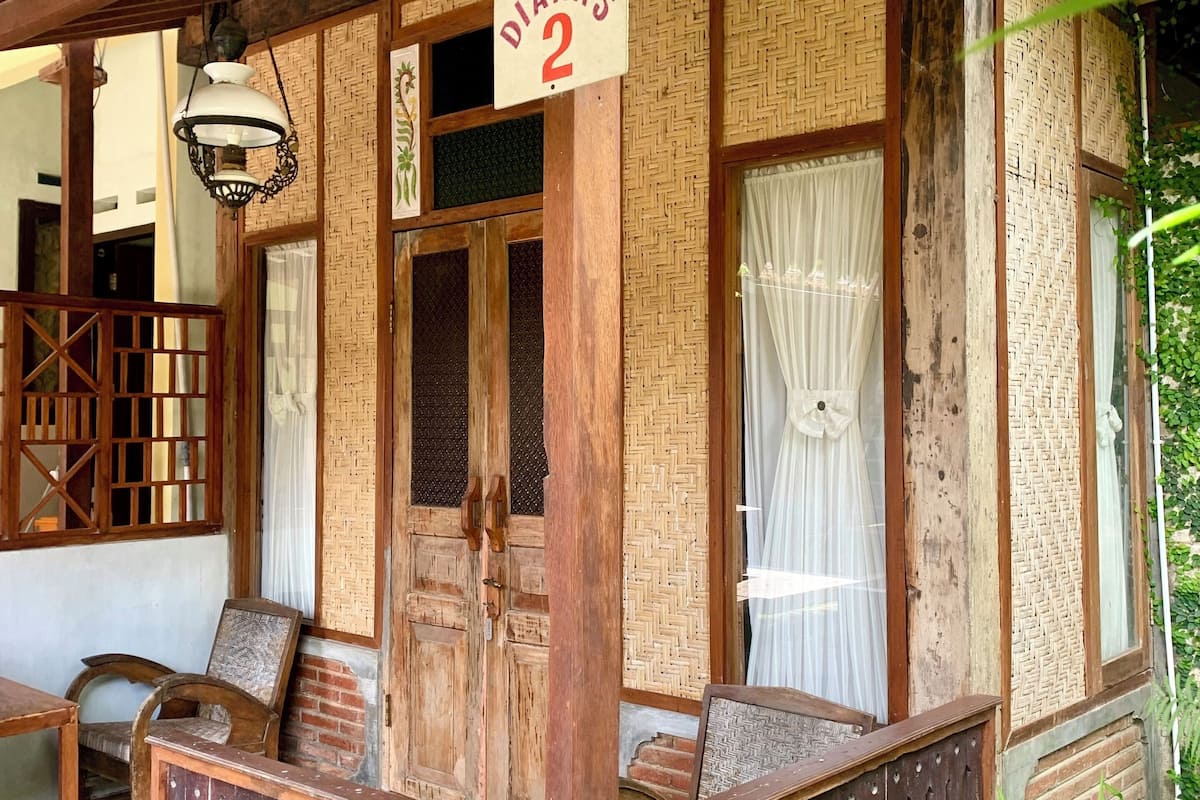 A traditional wooden structure with a sign reading "DIANA'S 2".