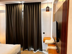 Habitación Confort, vistas a la ciudad | Zona de estar