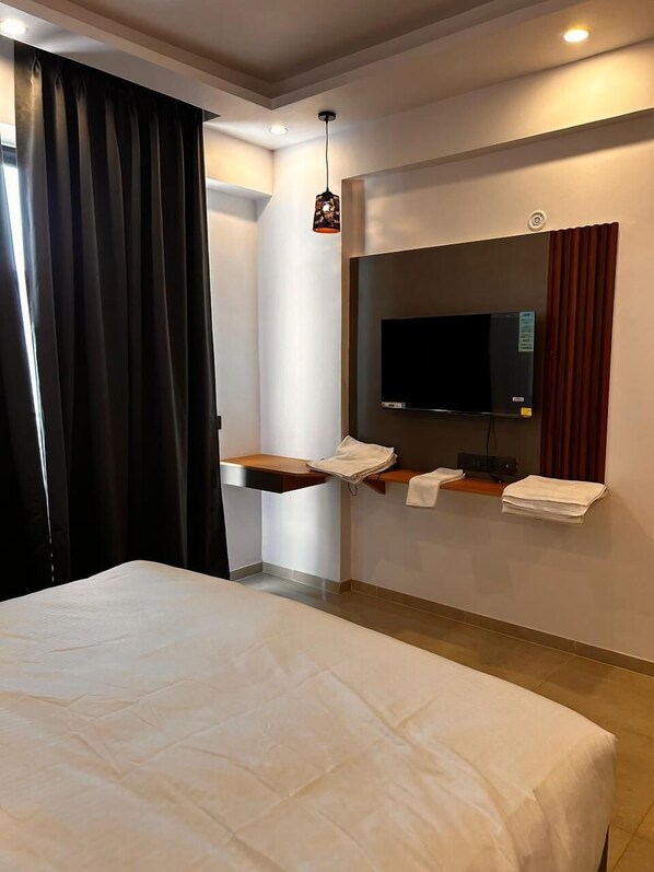 Habitación Confort, vistas a la ciudad | Zona de estar