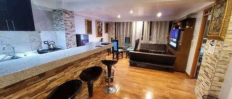 Family Apartment, Multiple Beds, Patio, River View | Living area