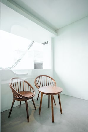 Design Room, Balcony, City View | Desk, laptop workspace, blackout drapes, free WiFi