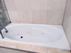 Jetted tub, towels, soap, toilet paper