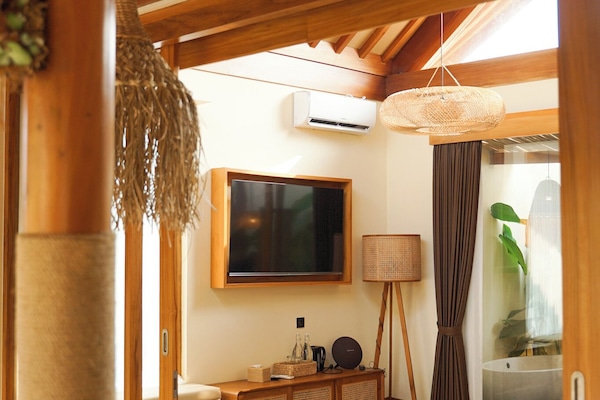 Villa, Pool View | Minibar, WiFi (free), bed sheets