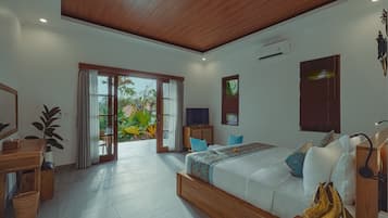 Deluxe Suite, Garden View | In-room safe, iron/ironing board, free WiFi