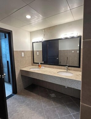 Hair dryer, towels, soap, shampoo