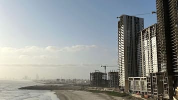 Espreguiçadeiras, toalhas de praia