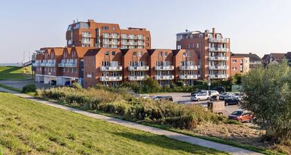 Vacation apartment with terrace and garden on the dike and the North Sea beach -