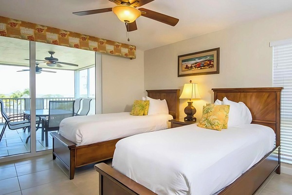 Rest easy in a bright bedroom with comfy double beds.