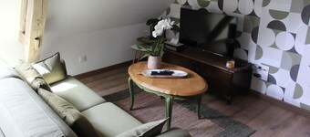 Magnificent, cosy suite in the heart of Anjou, tastefully renovated throughout.