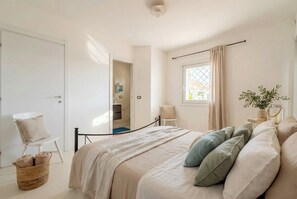 2 dormitorios, tabla de planchar con plancha, wifi gratis y ropa de cama