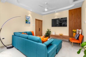 Apartamento, 1 cama King, sacada | Área de estar
