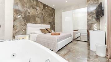 Deluxe Suite, Balcony | Desk, laptop workspace, free WiFi