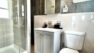 Hair dryer, towels, soap, shampoo