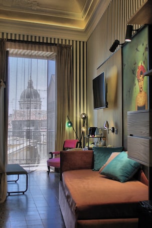 Deluxe Triple Room, Balcony, City View | Down comforters, in-room safe, desk, laptop workspace