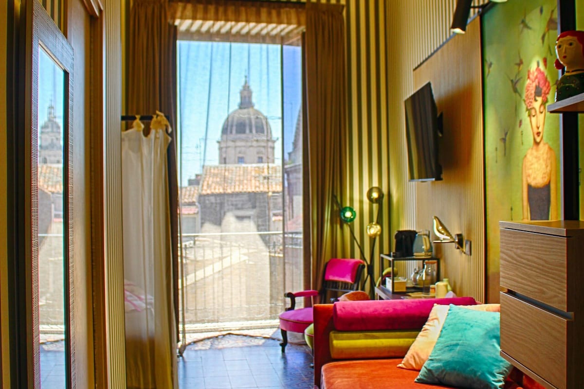 Deluxe Triple Room, Balcony, City View | In-room safe, desk, laptop workspace, blackout drapes