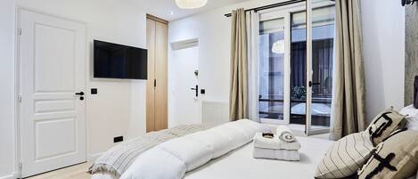 1 bedroom, laptop workspace, iron/ironing board, bed sheets