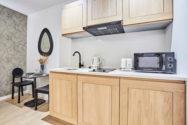 Apartment | Private kitchen | Fridge, microwave, coffee/tea maker, electric kettle