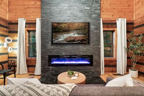 Smart TV, fireplace, video library