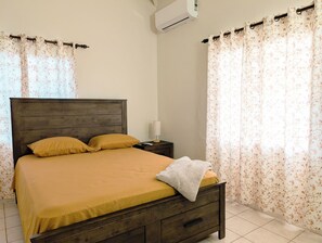 Desk, iron/ironing board, free WiFi, bed sheets - Sweet Suite Coconut: Charming modern 2BR/2BA house in Antigua with AC (St. George)