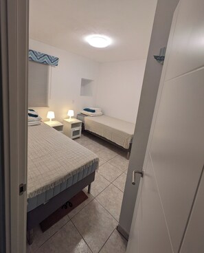 2 bedrooms, desk, iron/ironing board, travel cot