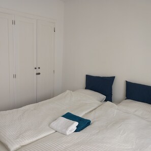 2 bedrooms, desk, iron/ironing board, travel cot