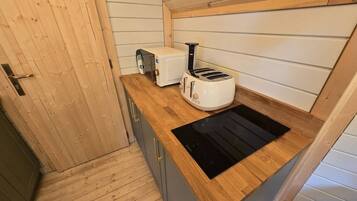 Microwave, stovetop, coffee/tea maker, toaster