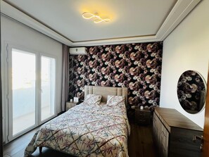 1 slaapkamer, een strijkplank/strijkijzer, wifi, beddengoed