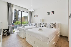 Exclusive Apartment, Balcony, City View | Down comforters, in-room safe, blackout drapes, soundproofing - PVH - Serene 2BR - Sobha Hartland Greens (Dubai)