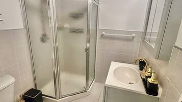 Hair dryer, towels, soap, toilet paper