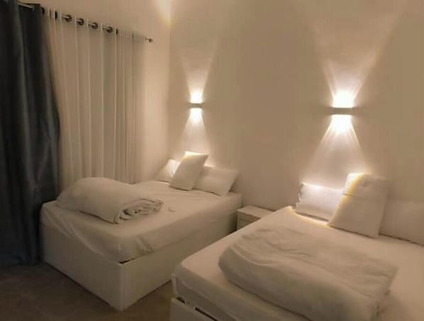 3 quartos, roupa de cama, acesso para cadeiras de rodas