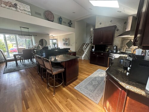 Welcoming 3-bdrm house with AC, heated pool with outdoor entertainment space