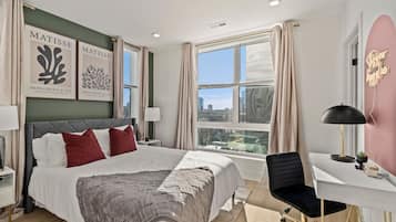 1 bedroom, desk, iron/ironing board, travel crib