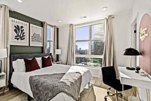 1 bedroom, desk, iron/ironing board, travel crib