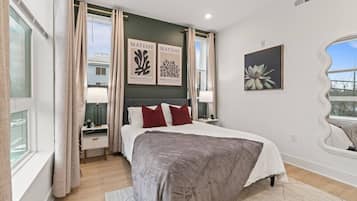 1 bedroom, desk, iron/ironing board, travel crib